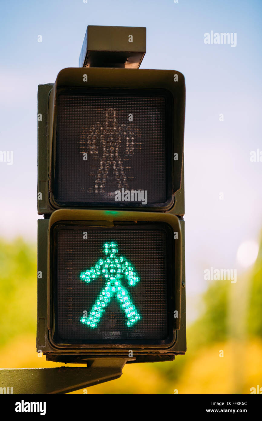 Green traffic light walk man. Road Safety Stock Photo