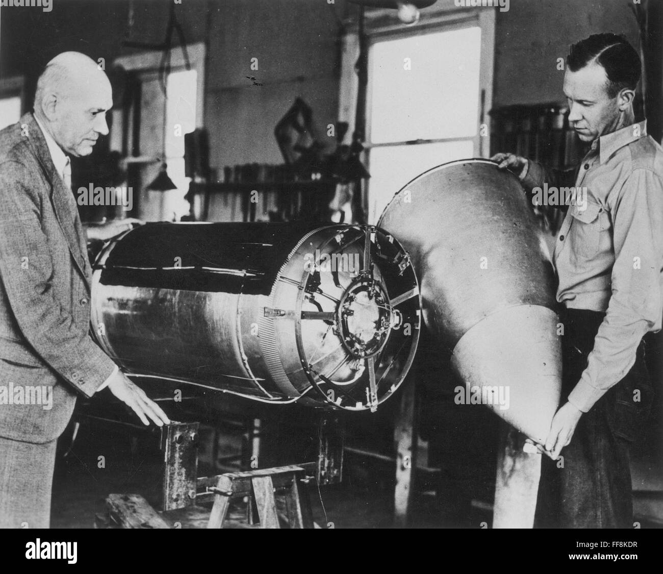 ROBERT HUTCHINGS GODDARD (1882-1945), American physicist, left, and an ...