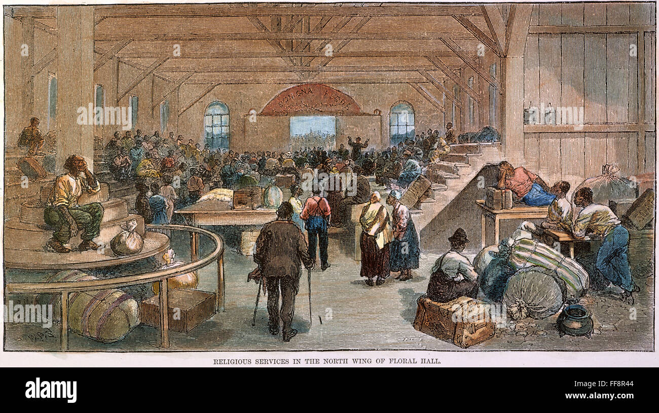 KANSAS: BLACK EXODUS, 1879. /nReligious services for black migrants from the American South in one of the buildings at Topeka, Kansas, used as a terminus of the exodus to the North and West following the end of Reconstruction. Colored engraving, 1879. Stock Photo