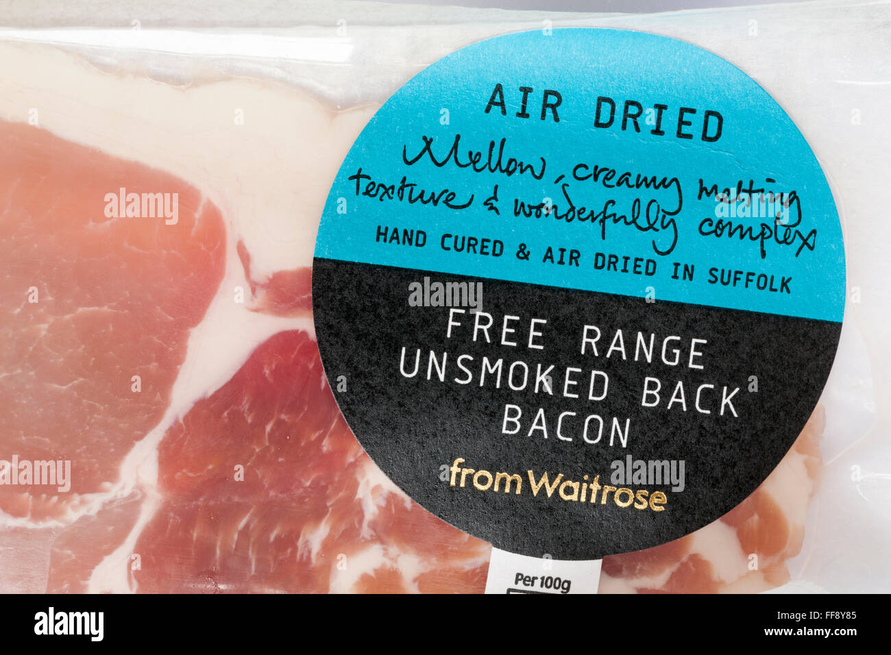 pack of Air dried free range unsmoked back bacon from Waitrose, hand cured & air dried in Suffolk Stock Photo