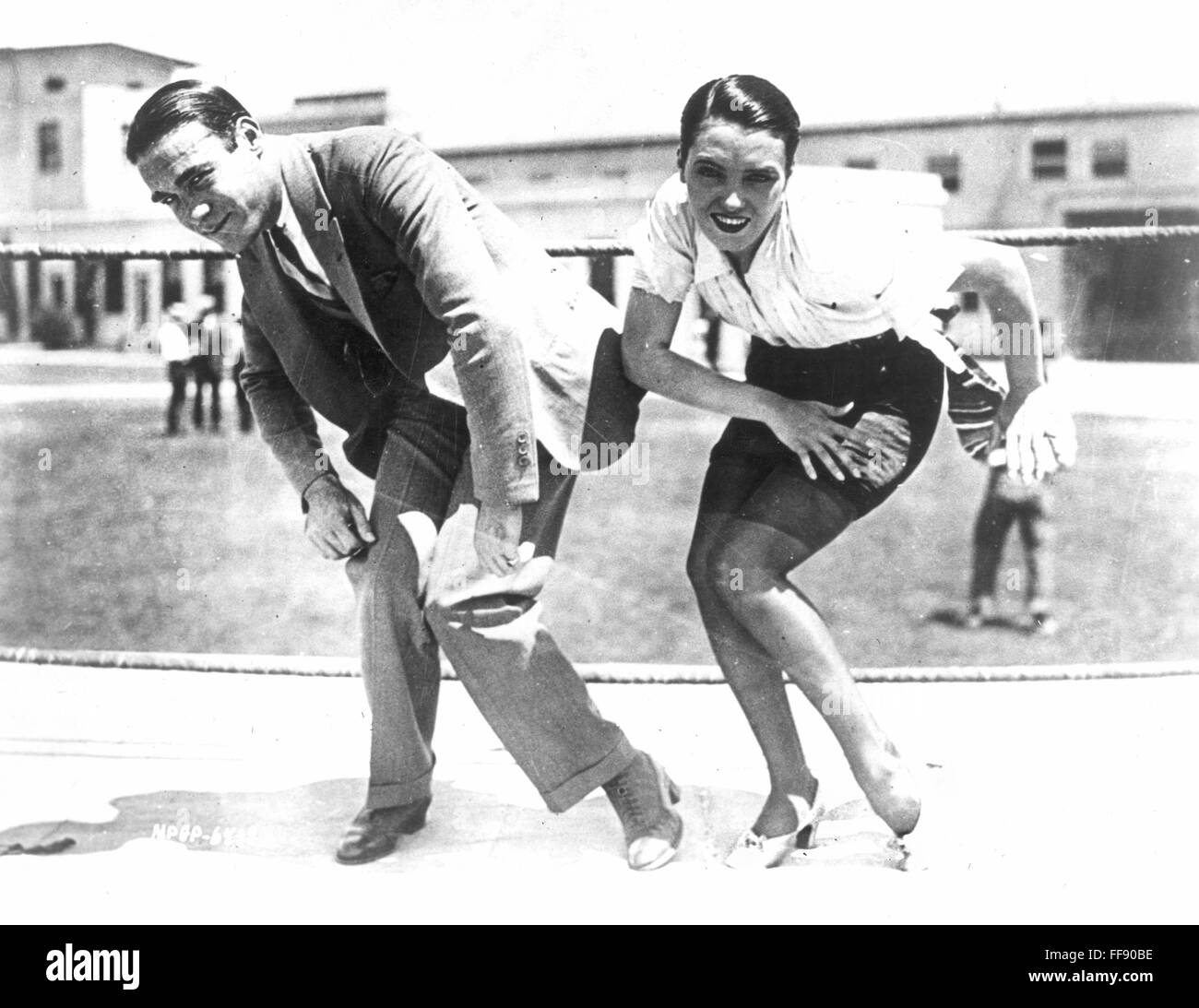 CHARLESTON DANCE, 1925. /nFrank Farnum, who popularized the Charleston, coaching Hollywood actress Pauline Starke for her role in 'A Little Bit of Broadway.' Stock Photo