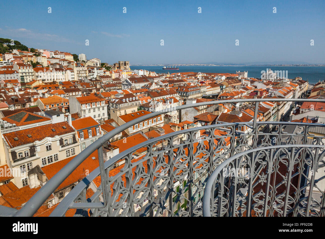 cast iron railing of the upper level terrace of Santa Justa Lift overlooking the Pombaline Downtown of Lisbon, Portugal Stock Photo
