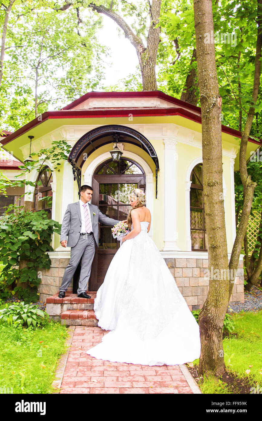 Young wedding couple enjoying romantic moments Stock Photo - Alamy