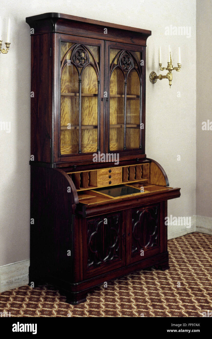 DESK: GOTHIC REVIVAL. /nAmerican desk and bookcase, Gothic Revival style. Rosewood and satinwood, 1836-50. Stock Photo
