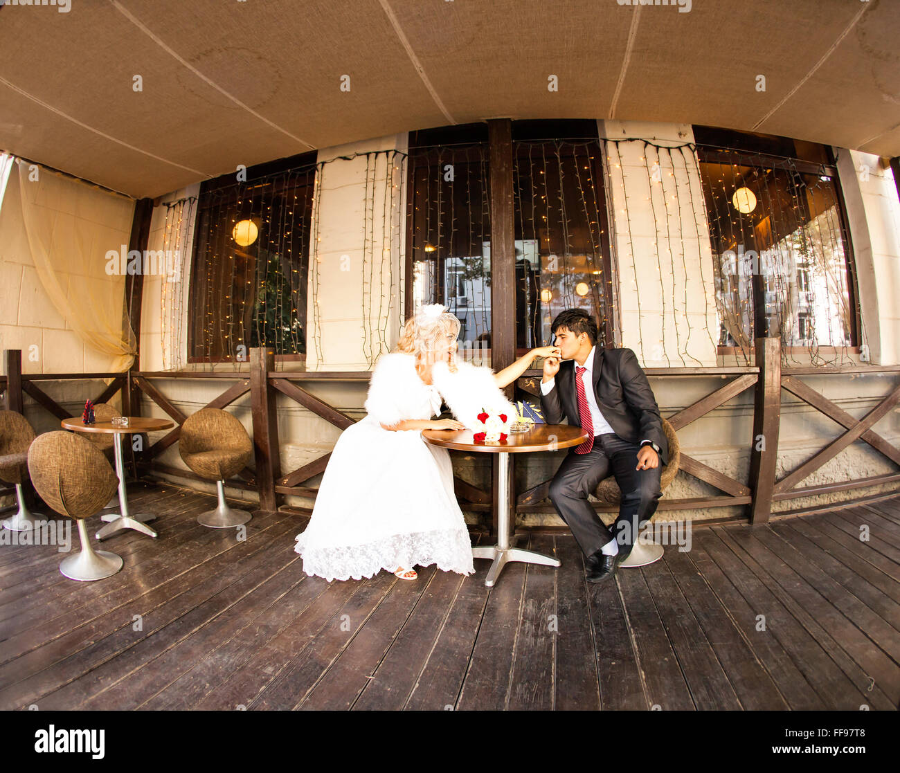 Young wedding couple enjoying romantic moments Stock Photo - Alamy