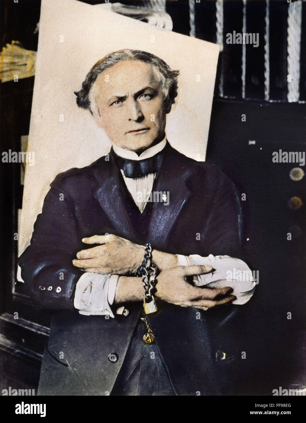 HARRY HOUDINI (18741926). /nAmerican magician. Houdini in handcuffs
