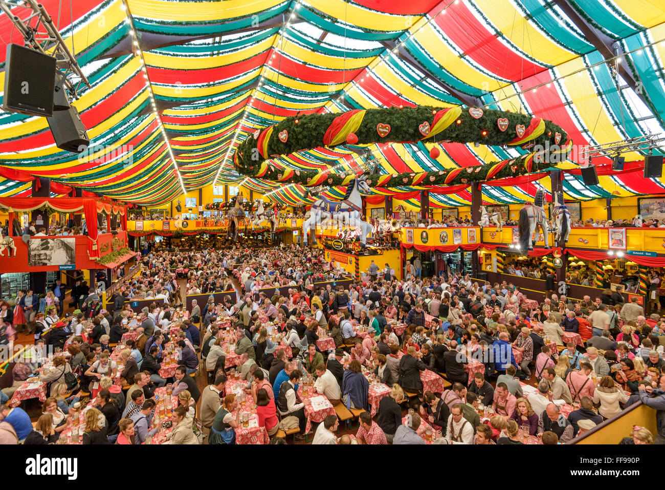 Crowds in the Hippodrom Beer Tent on the Theresienwiese Oktoberfest fair grounds in Munich, Germany. Stock Photo