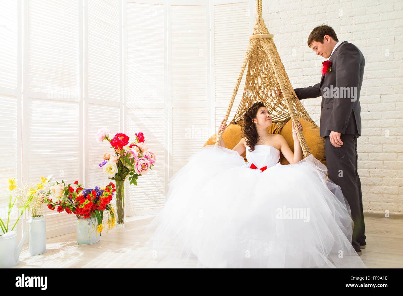 Young wedding couple enjoying romantic moments Stock Photo - Alamy