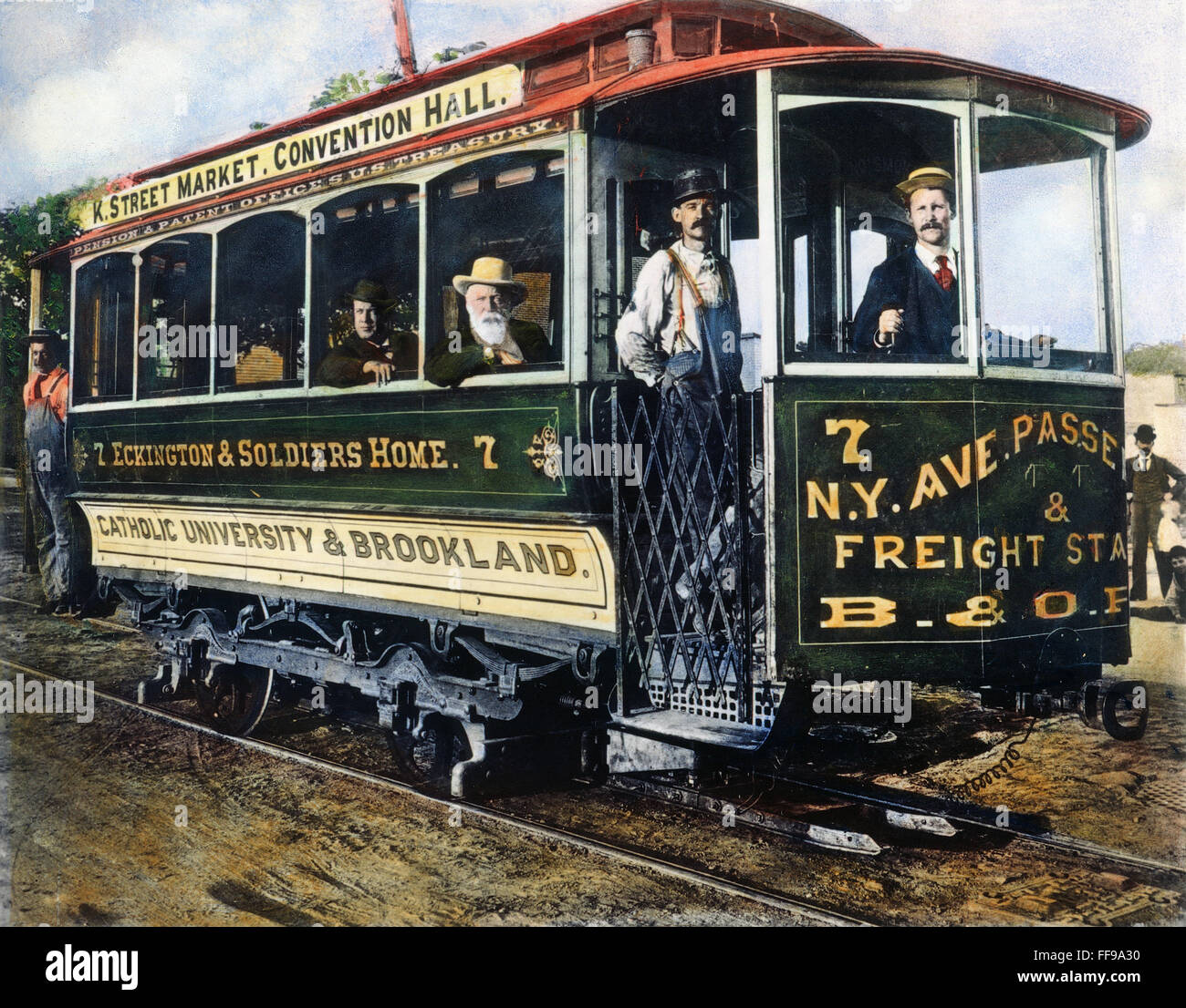 STREET CAR, c1895. /nAn electric street car in Washington, D.C. employing a surface contact system using a skate to supply the power at the front of the car. Oil over a photograph, c. 1895. Stock Photo