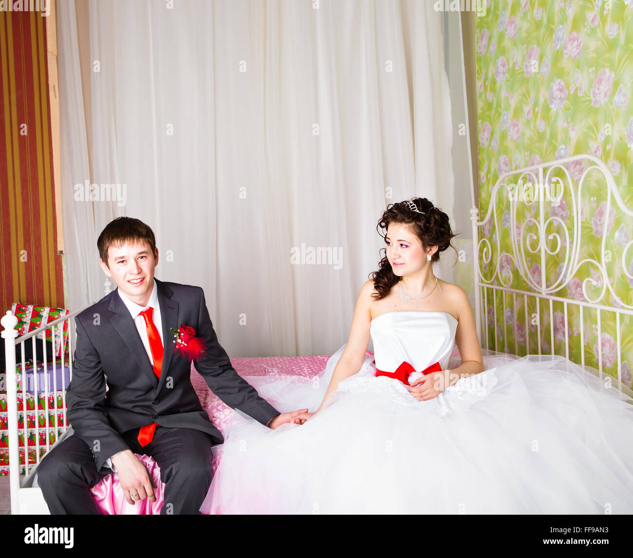 Young wedding couple enjoying romantic moments Stock Photo - Alamy