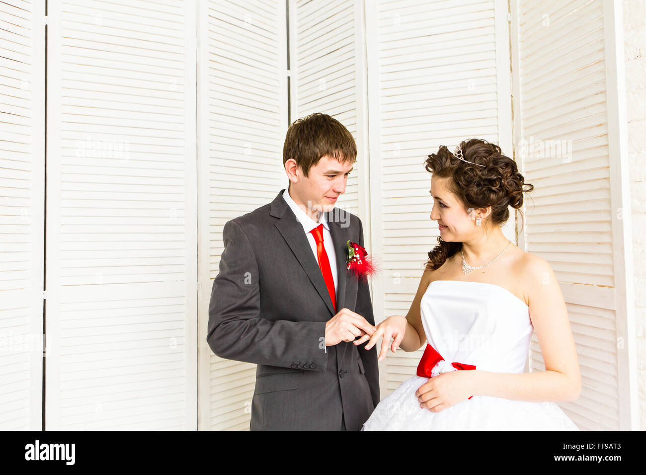 Young wedding couple enjoying romantic moments Stock Photo - Alamy