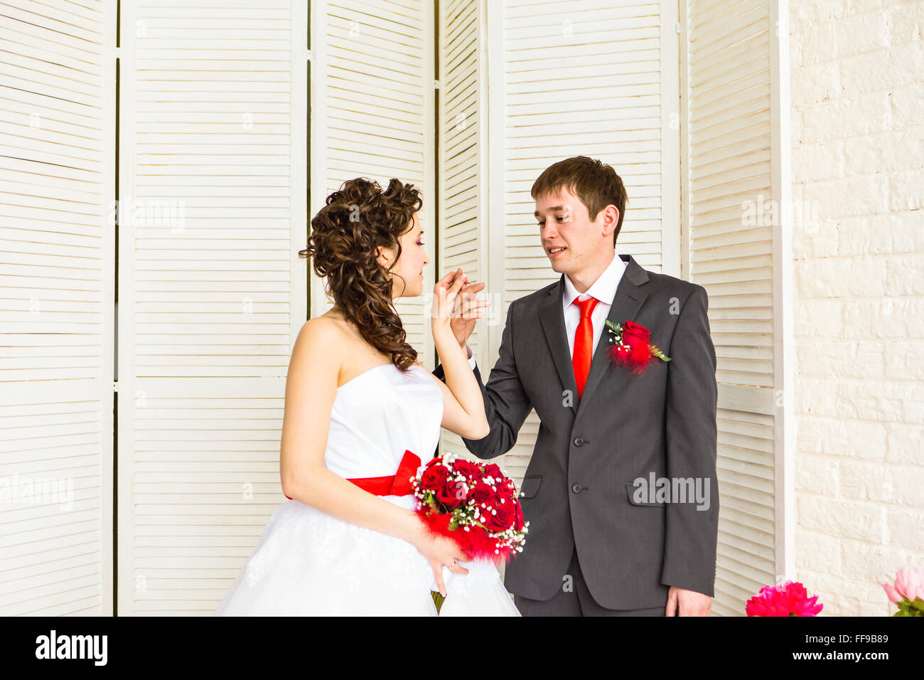 Young wedding couple enjoying romantic moments Stock Photo - Alamy