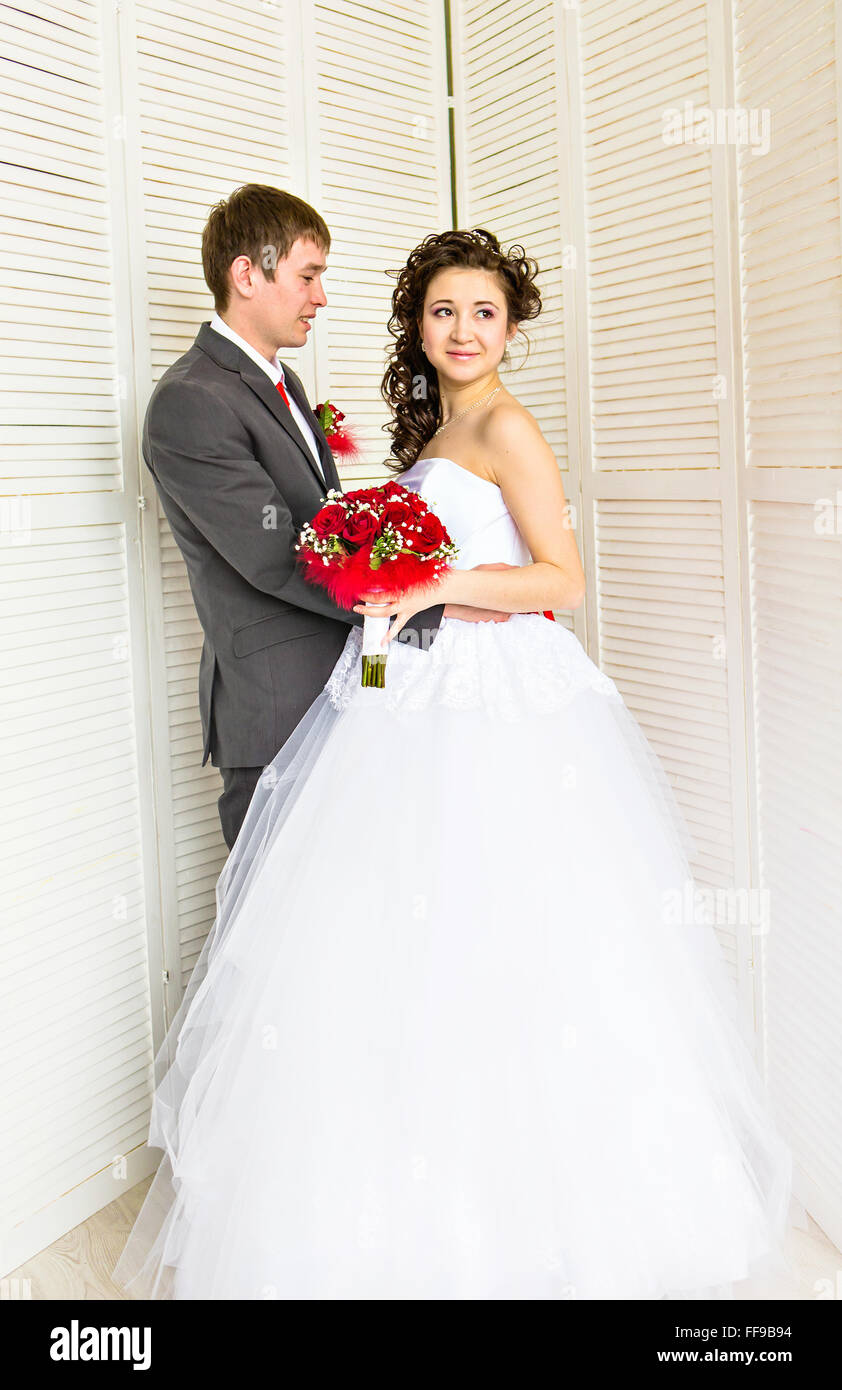 Young wedding couple enjoying romantic moments Stock Photo - Alamy
