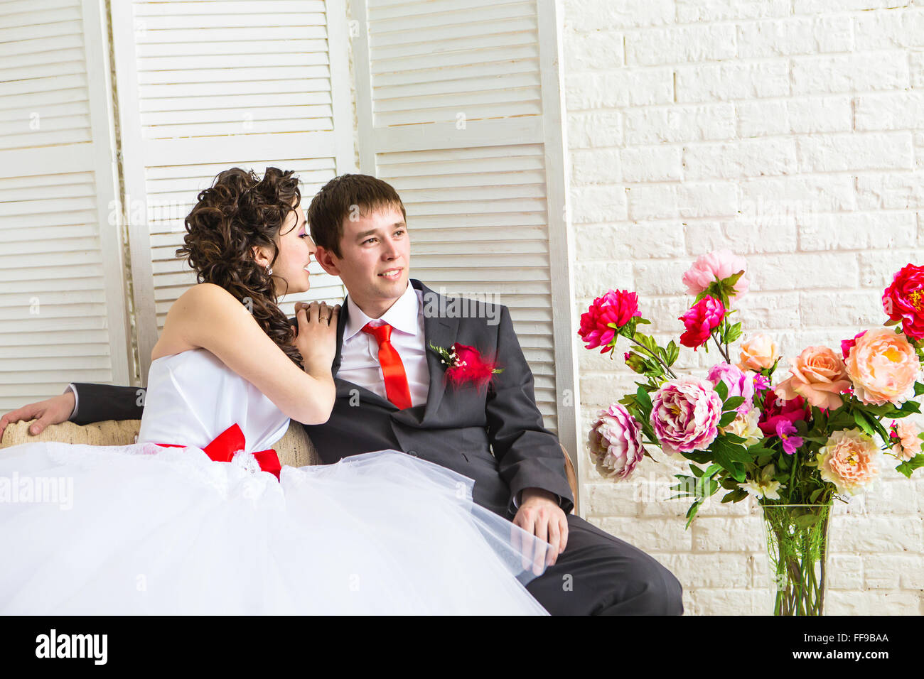 Young wedding couple enjoying romantic moments Stock Photo - Alamy