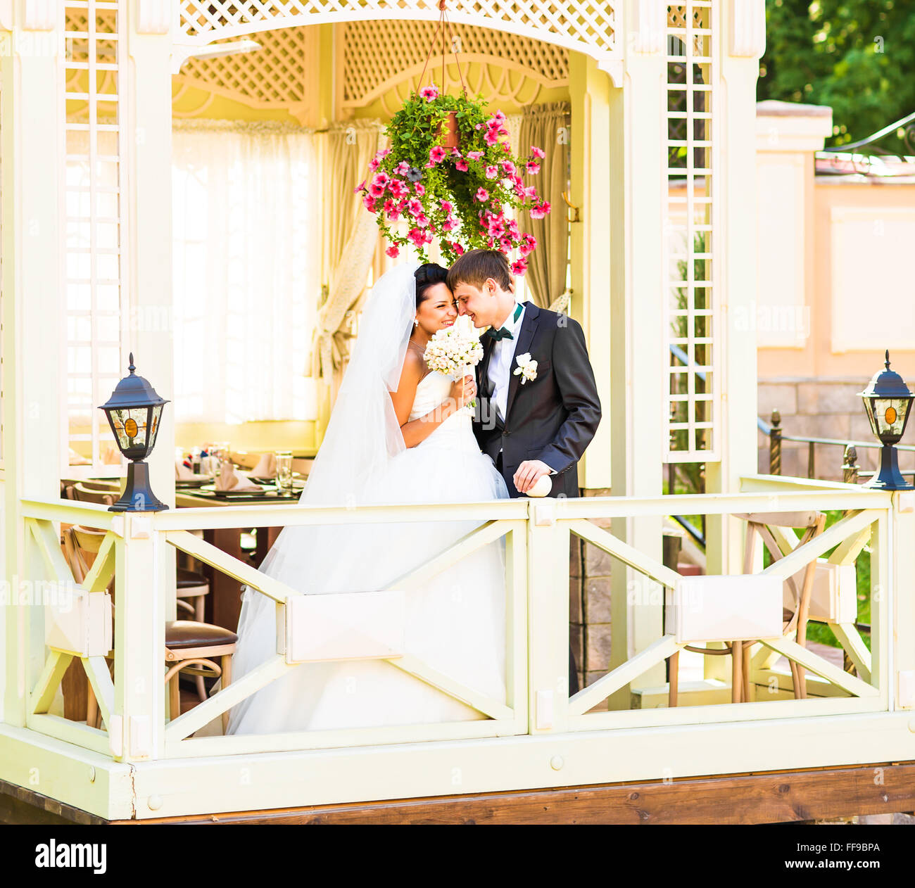 Young wedding couple enjoying romantic moments Stock Photo - Alamy