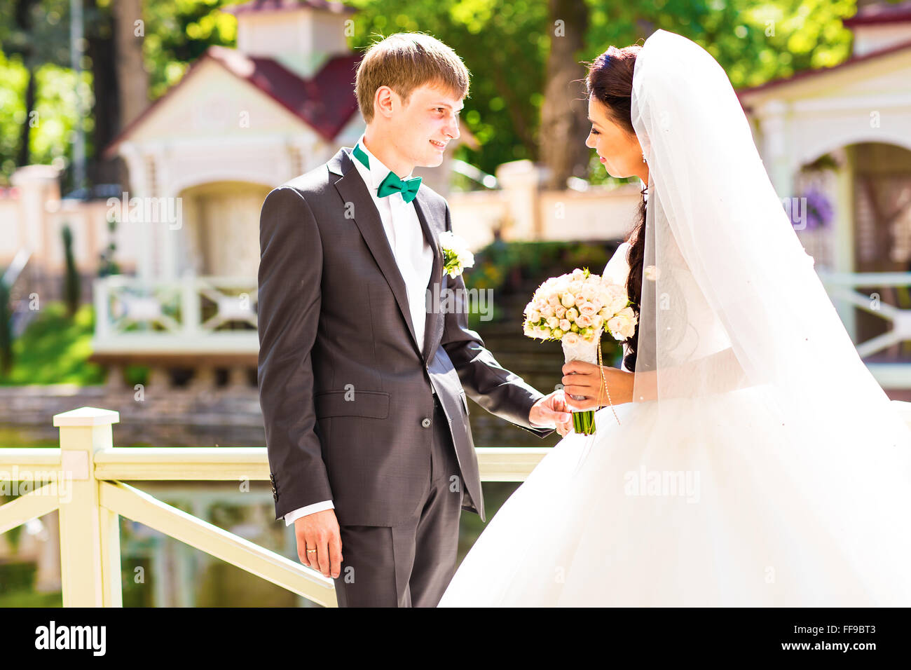 Young wedding couple enjoying romantic moments Stock Photo - Alamy