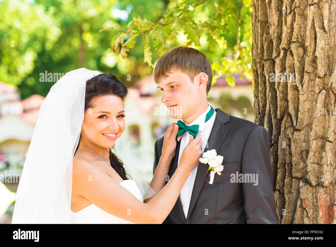 Young wedding couple enjoying romantic moments Stock Photo - Alamy