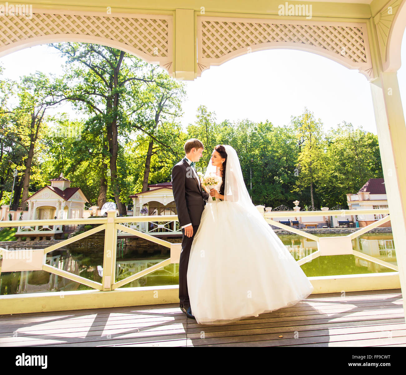 Young wedding couple enjoying romantic moments Stock Photo - Alamy
