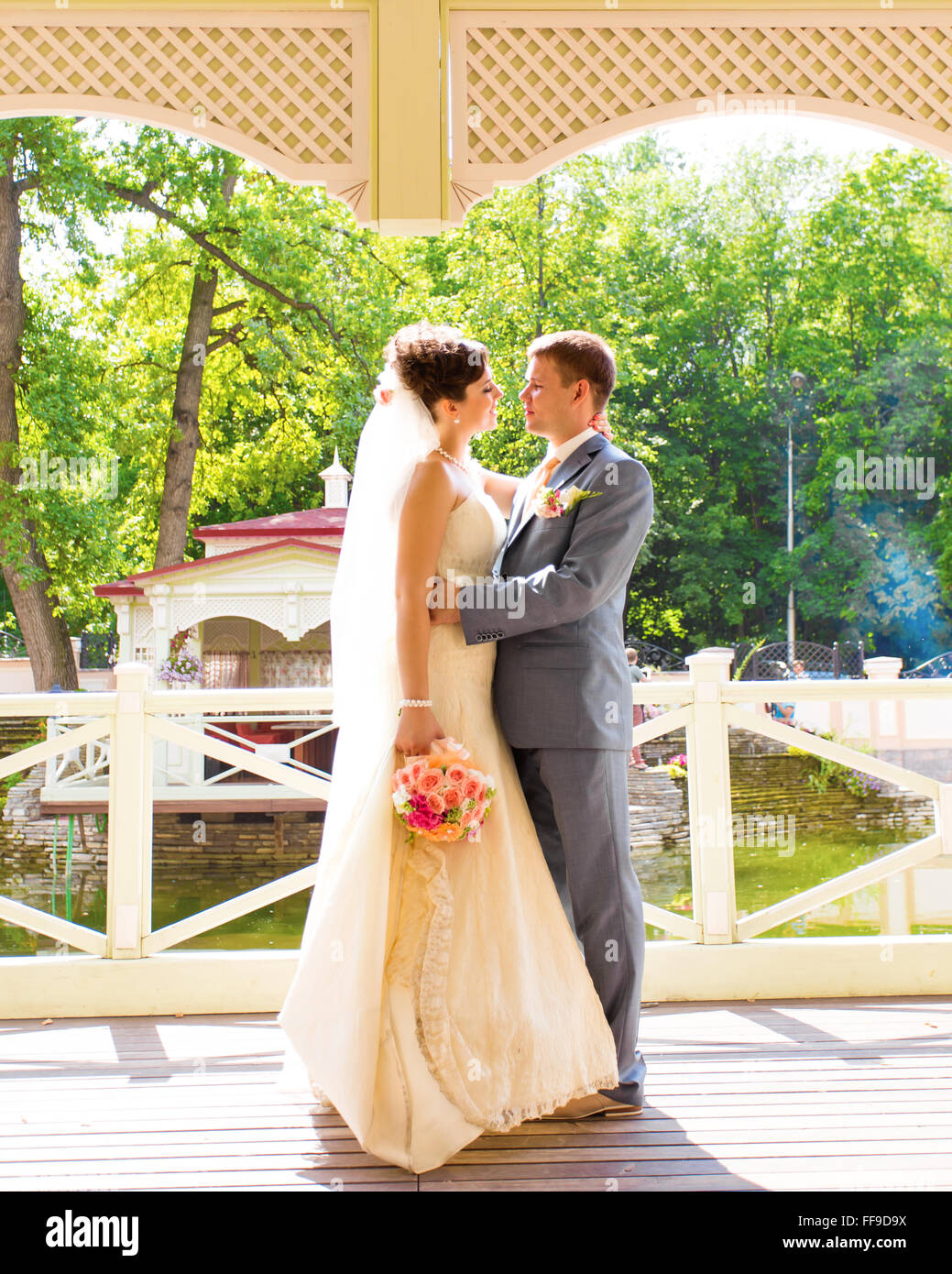Young wedding couple enjoying romantic moments Stock Photo - Alamy
