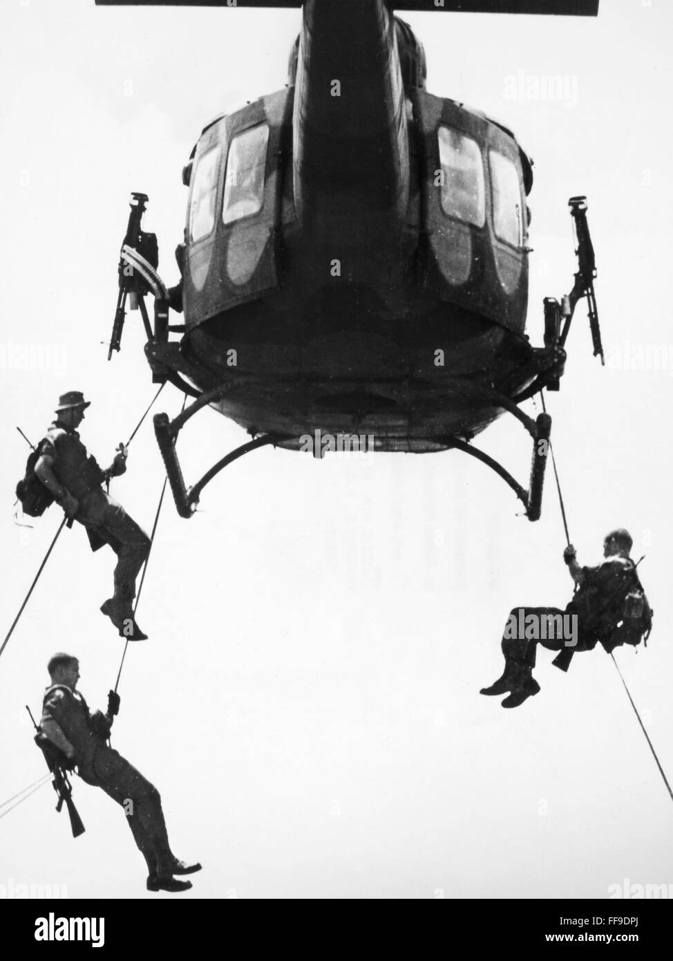 VIETNAM WAR: HELICOPTER. /nTroopers of the 173rd Airborne Brigade rappel from a helicopter in South Vietnam, December 1966. Stock Photo
