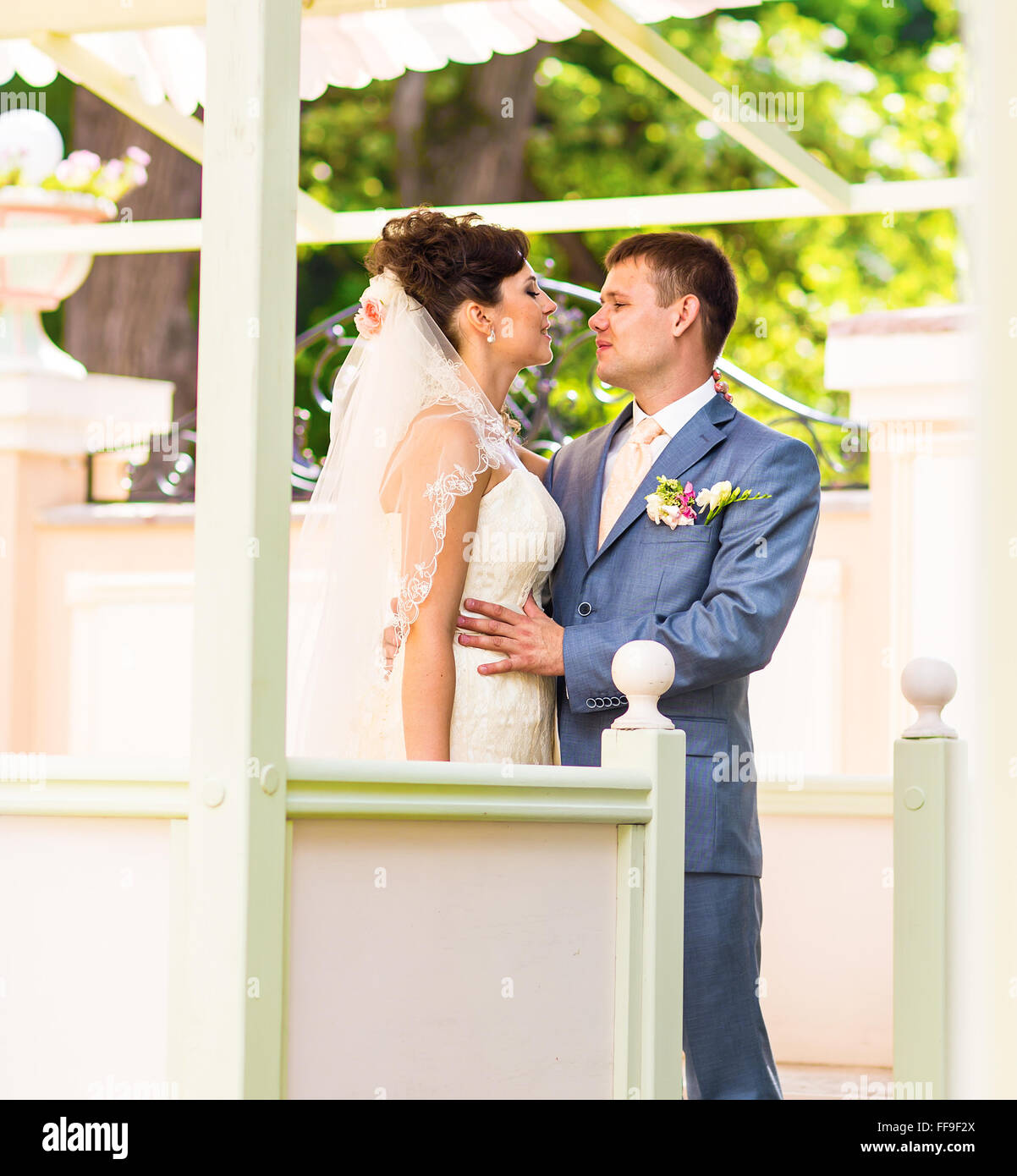Young wedding couple enjoying romantic moments Stock Photo - Alamy