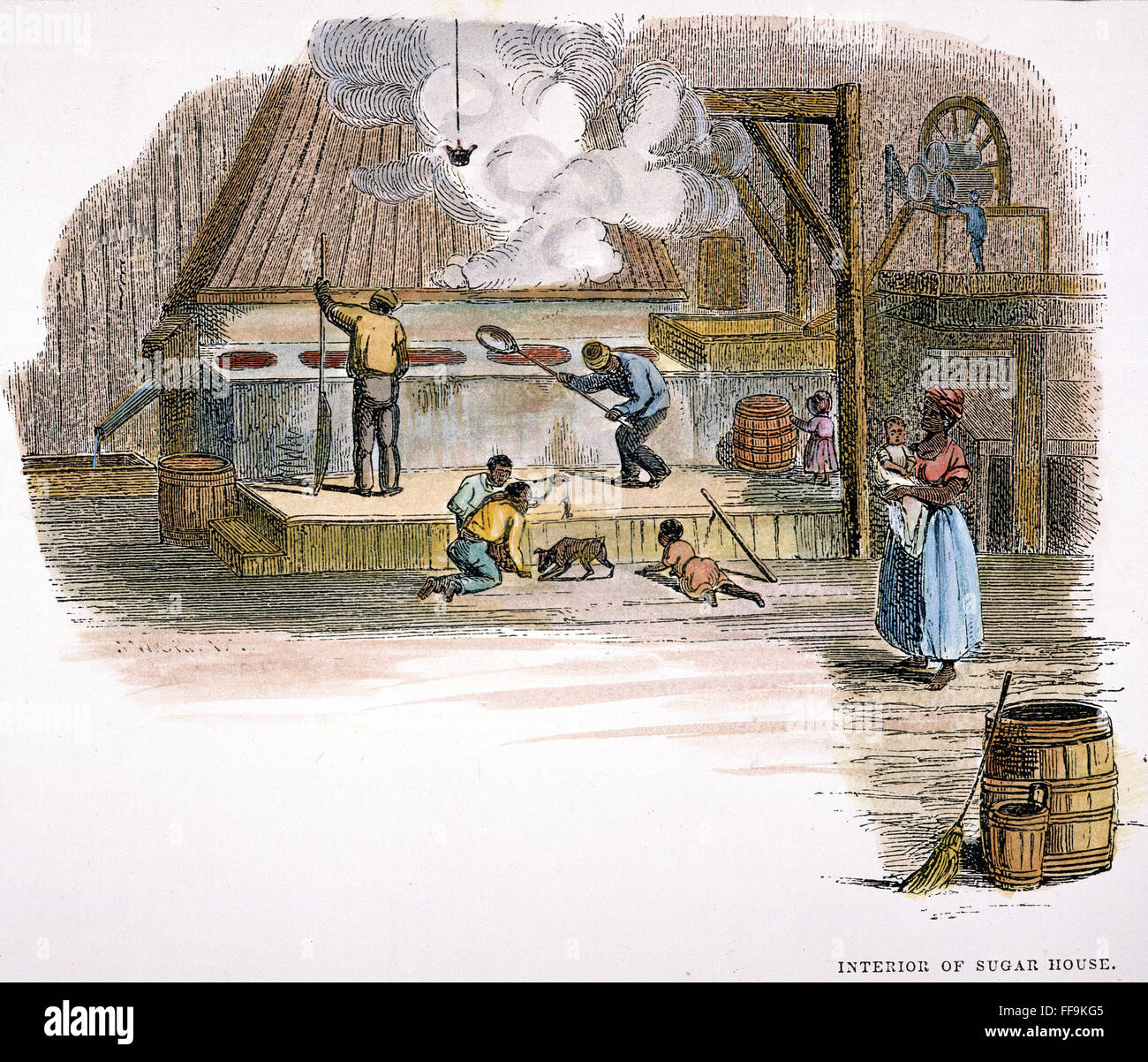 SUGAR PLANTATION. /nBlack slaves at work in a Louisiana sugar mill: wood engraving, American, 1853. Stock Photo