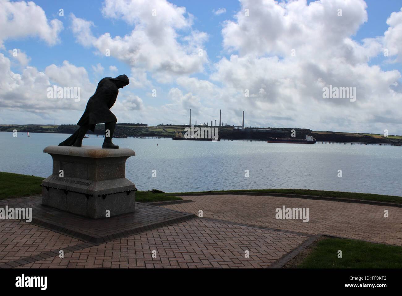 Statue of tribute to fishermen on promenade in Milford Haven