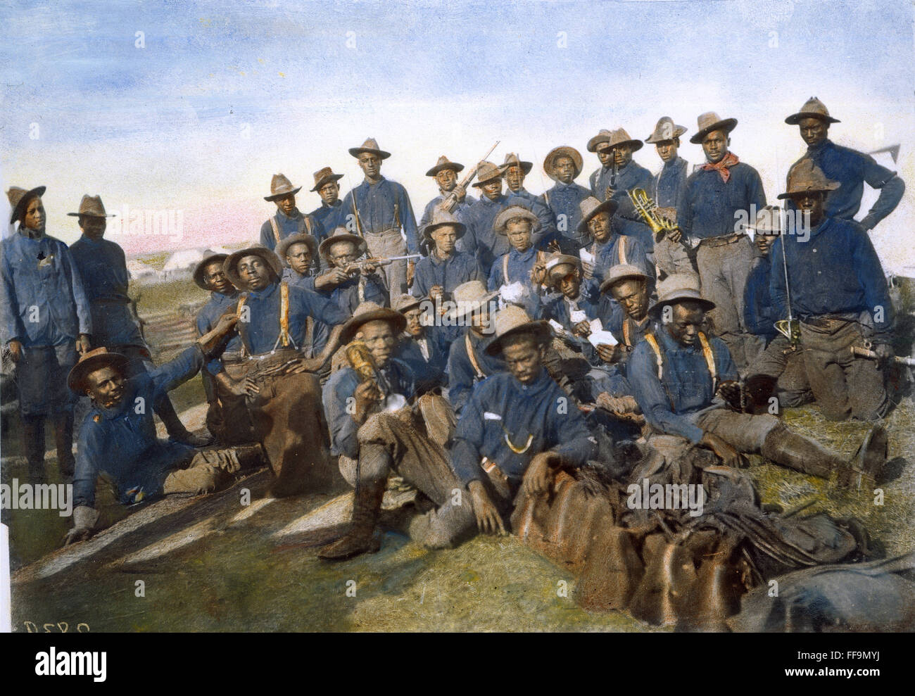 CUBA: TENTH CAVALRY, 1898. /nMembers of the U.S. Tenth (Colored) Cavalry on San Juan Hill, Cuba, following its capture, July 1898, during the Spanish American War. Oil over a photograph. Stock Photo