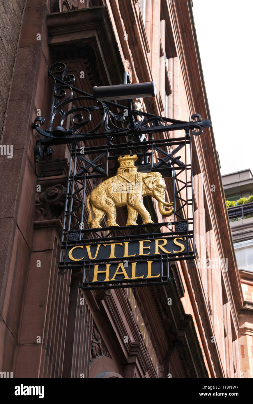 An golden elephant signage outside the Worshipful Company of Cutlers historic building, London, United Kingdom. Stock Photo