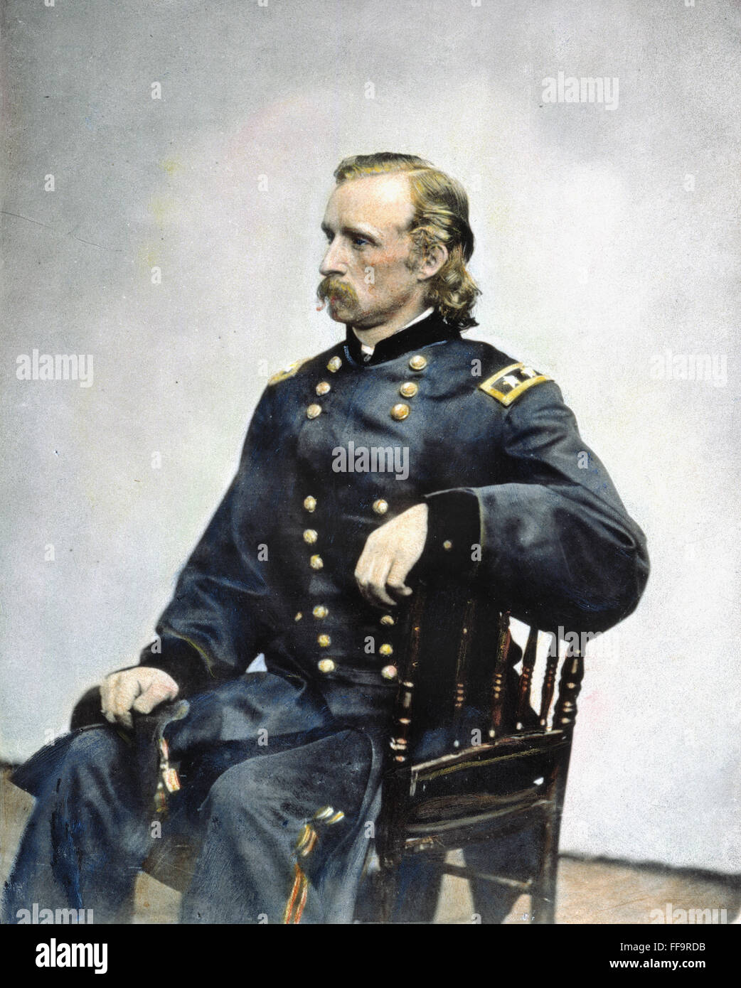 GEORGE ARMSTRONG CUSTER /n(1839-1876). American army officer. Oil over a photograph, 1865, by Mathew Brady. Stock Photo