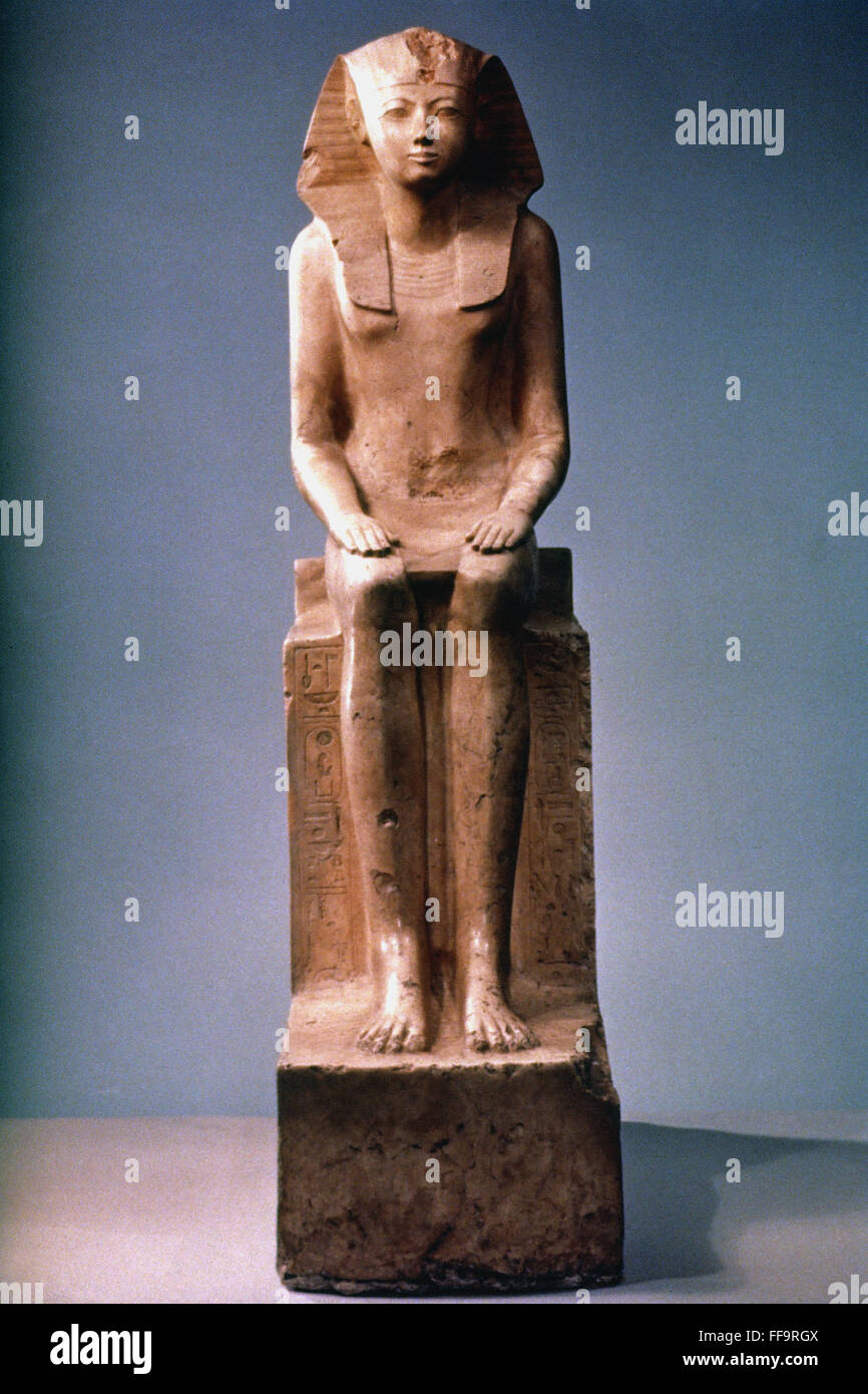 QUEEN HATSHEPSUT. /nEgyptian limestone statue of Queen Hatshepsut, c. 1485 B.C. Stock Photo