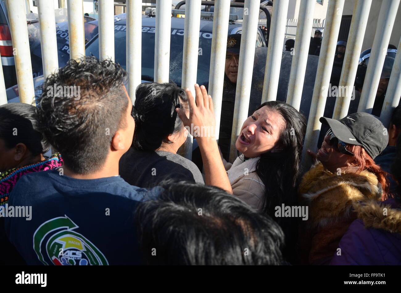 Monterrey, Mexico. 11th Feb, 2016. Family members of inmates wait for information outside the Topo Chico prison, in Monterrey, in the state of Nuevo Leon, Mexico, on Feb. 11, 2016. Jaime Rodriguez Calderon, governor of Nuevo Leon, informed a press conference that 52 people were killed and 12 injured after a fight broke out between two rival fractions of inmates inside the Topo Chico prison. © ABC/Xinhua/Alamy Live News Stock Photo