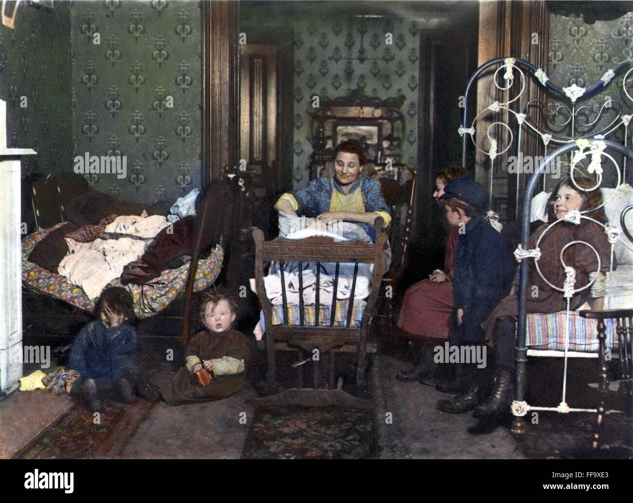 NEW YORK TENEMENT LIFE. /nOil over a photograph, c1910, by Lewis Hine. Stock Photo