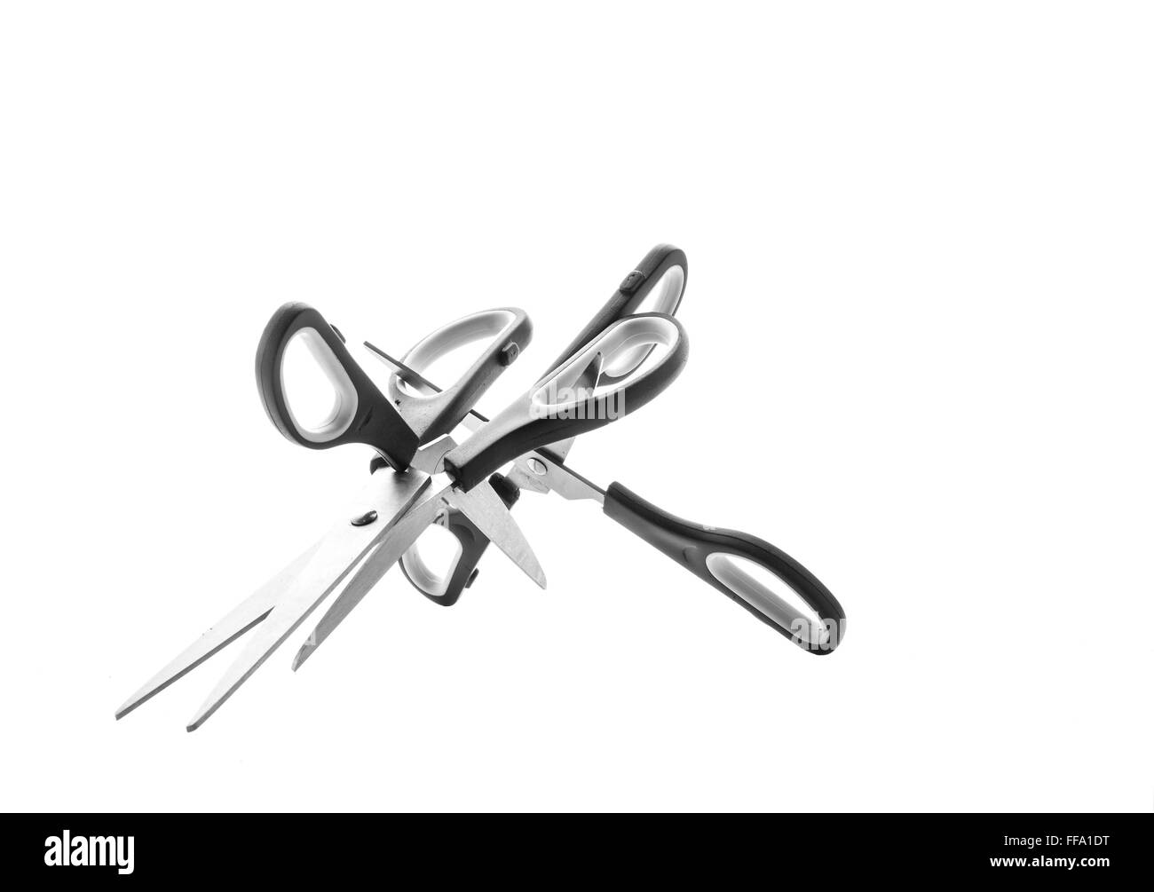 Pile of Scissors on white background Stock Photo