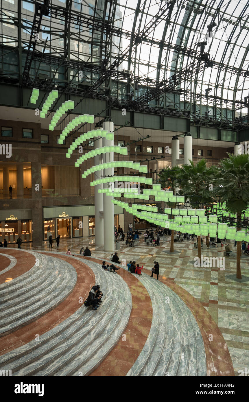 The Winter Garden of Brookfield Place in the Financial District, NYC, with its palm trees and Luminaries light installation Stock Photo