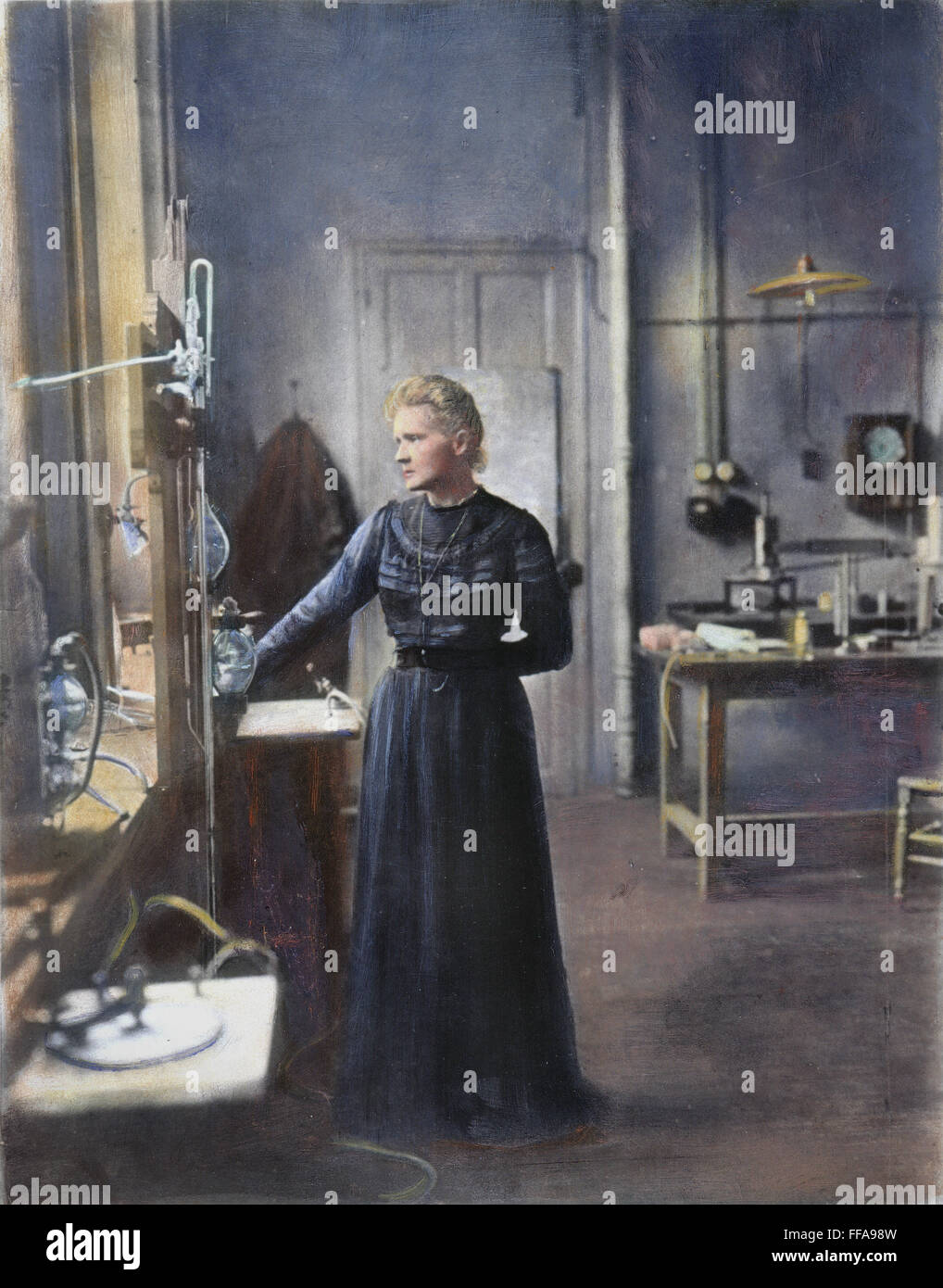 MARIE CURIE (1867-1934). /nMarie Sklodowska Curie. French (Polish-born) chemist. In her laboratory at the Sorbonne, Paris. Oil over a photograph, c1908. Stock Photo
