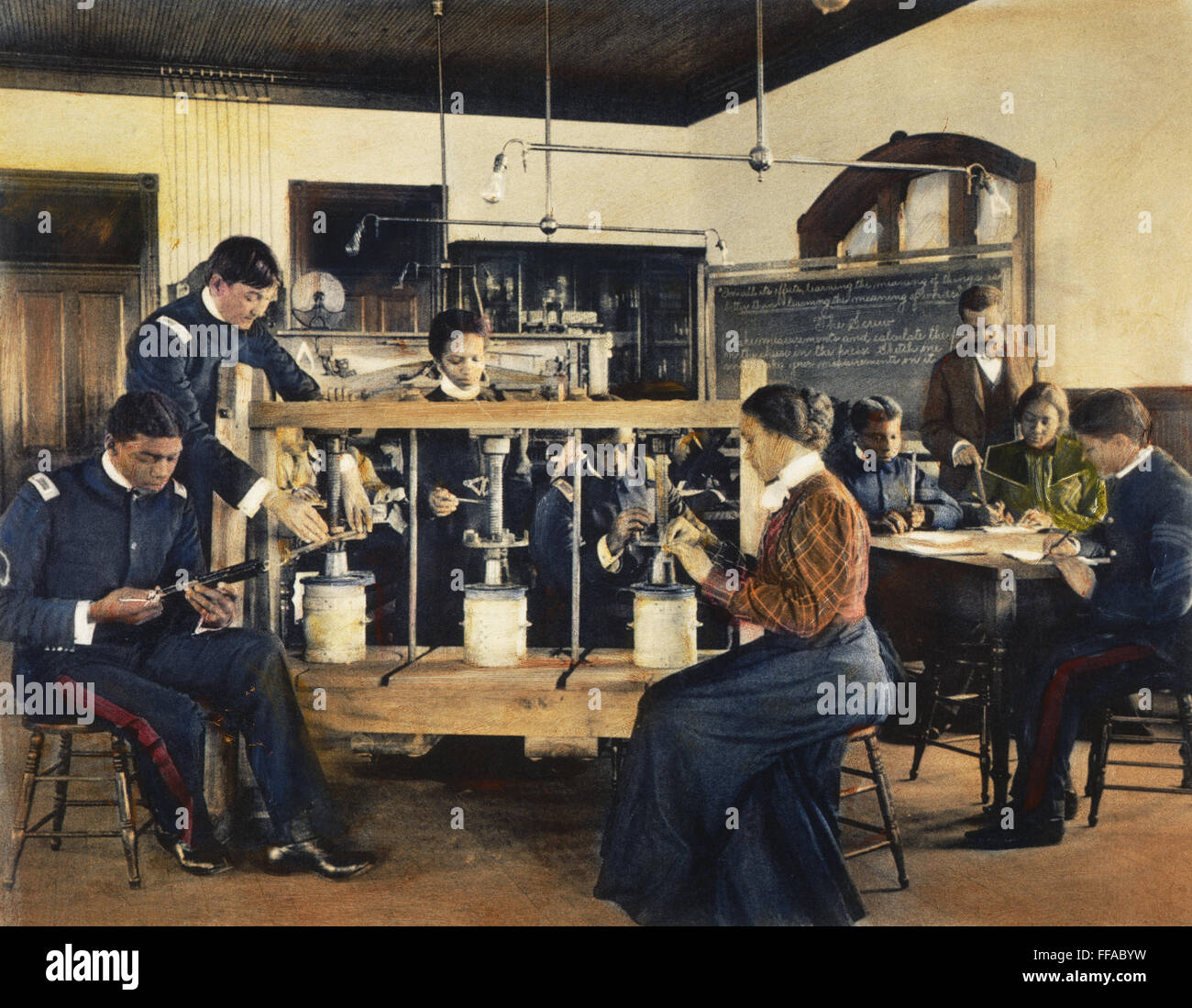 HAMPTON INSTITUTE, 1899. /nA physics class at the Hampton Institute learning the priciple of the screw as applied to the cheese press: oil over a photograph, 1899, by Frances Bejamin Johnston. Stock Photo