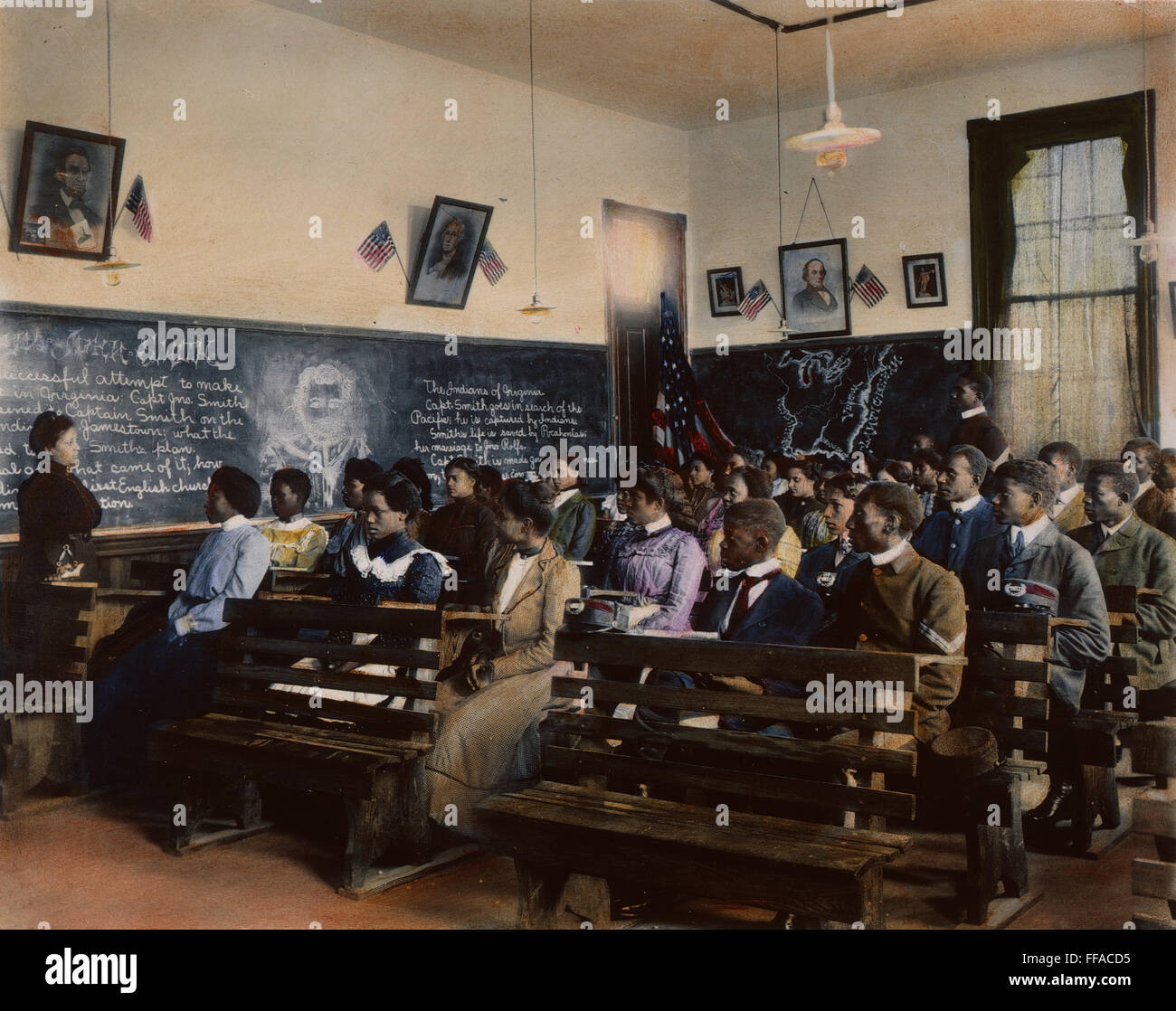 TUSKEGEE: HISTORY CLASS. /nStudents at Tuskegee Institute learning about the Jamestown colony in a history class: oil over a photograph, 1902, by Frances Benjamin Johnston. Stock Photo