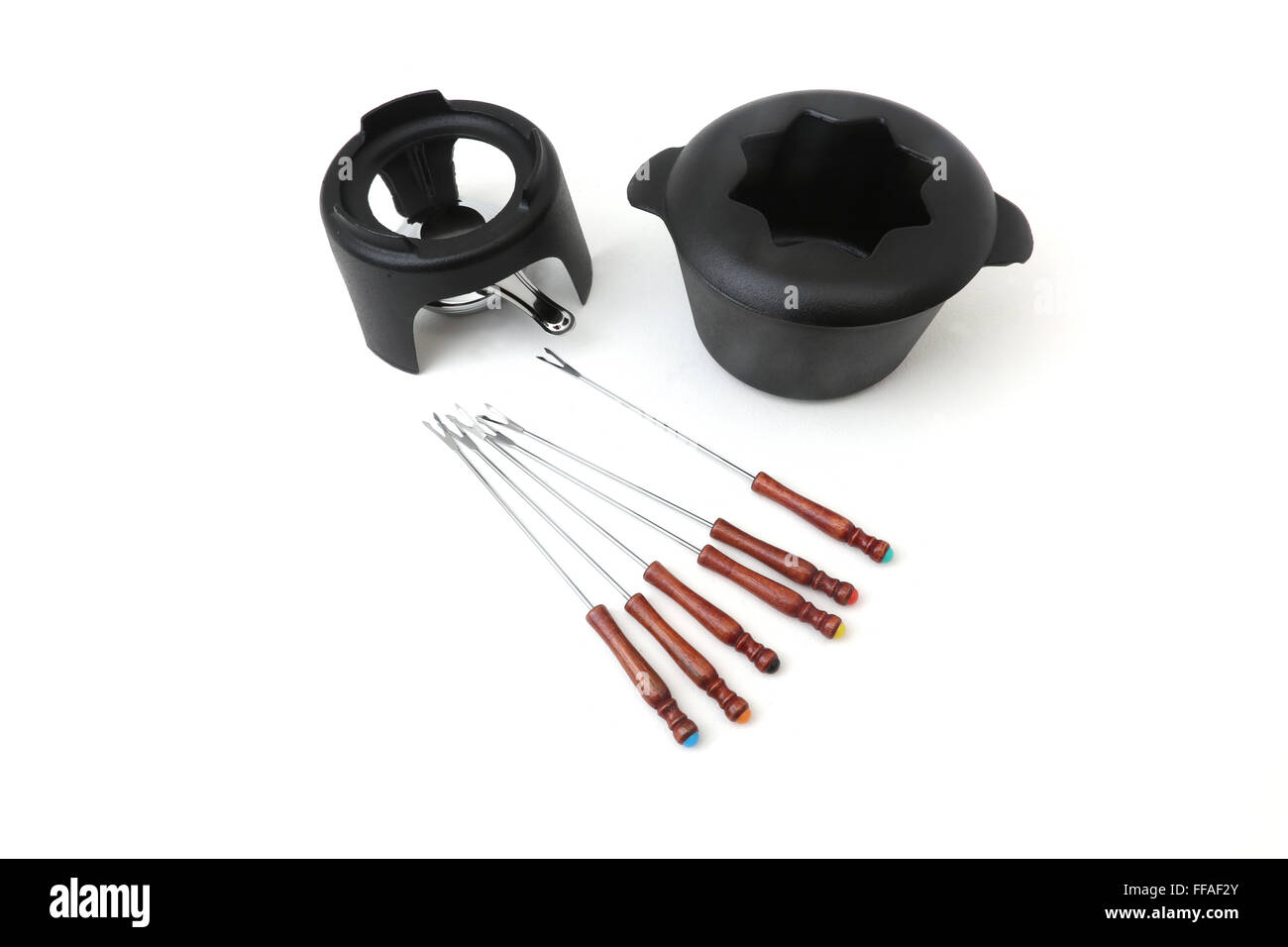 Cast Iron Fondue Set Burner, Pot And Forks Stock Photo Alamy