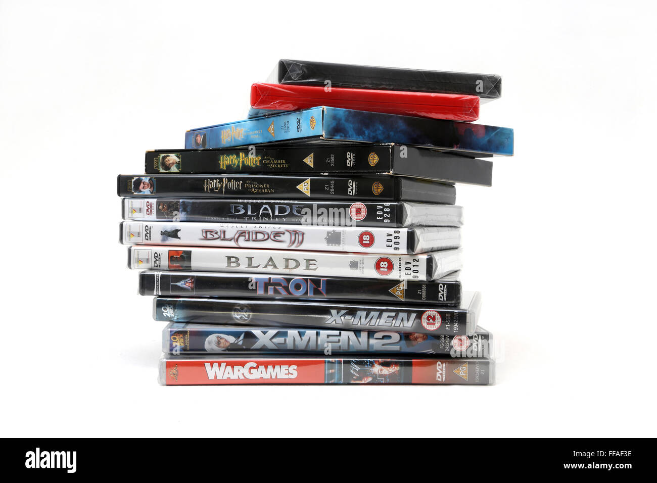 A Pile Of DVDs Harry Potter, Blade Trilogy, Tron, X-Men And X-Men 2 And Wargames Stock Photo