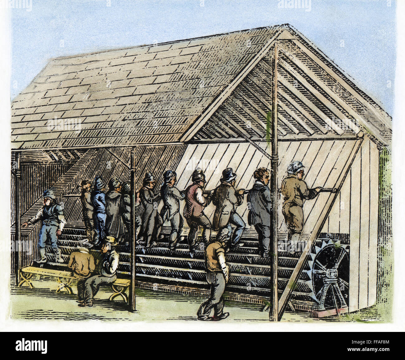 TREADMILL AT COTTON MILL. /nMen on the treadmill that provided the