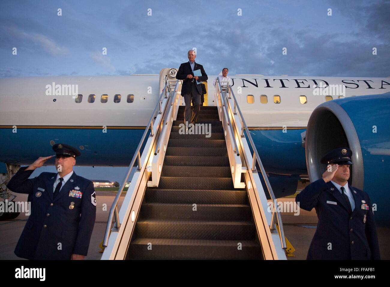 U.S Vice President Joe Biden walks down the stairs of Air Force Two at New Castle County Airport August 23, 2013 in Wilmington, Delaware. Stock Photo