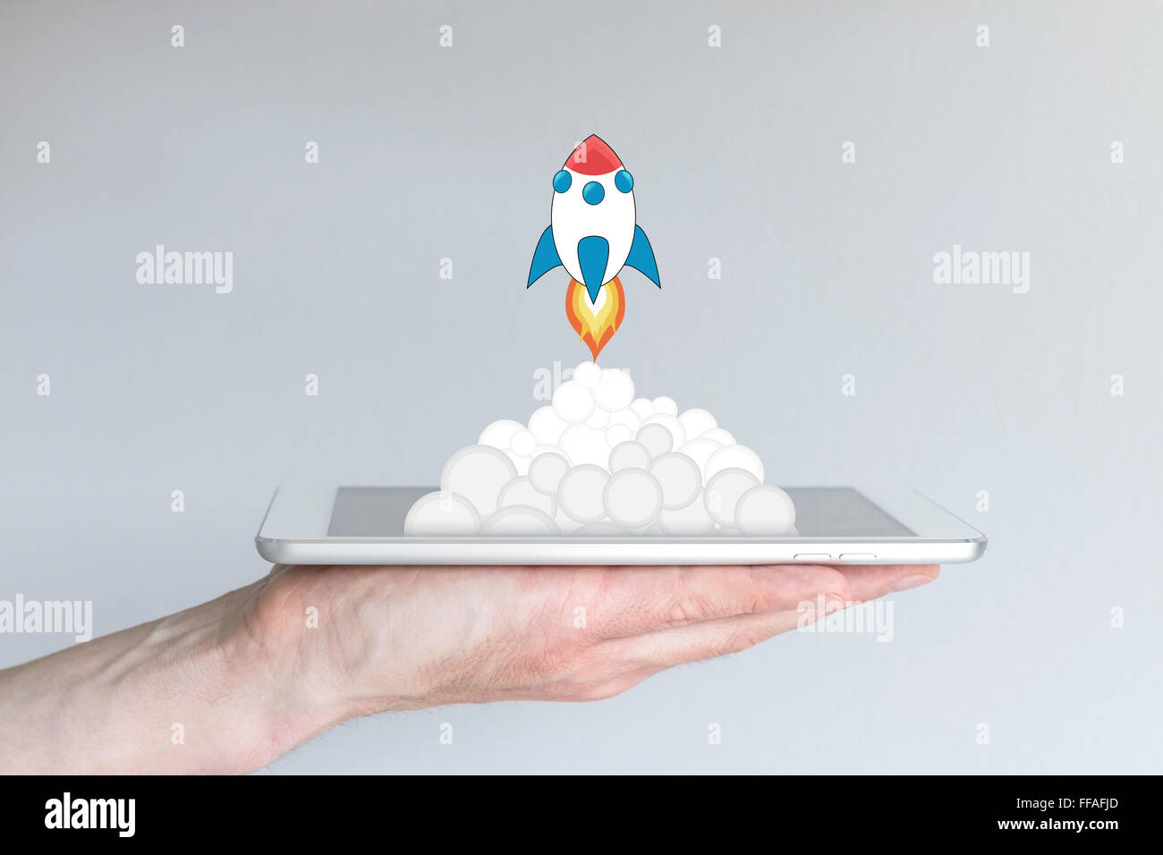 Concept of successful mobile computing business or strategy, e.g. for app development or business startups. Rocket launching fro Stock Photo