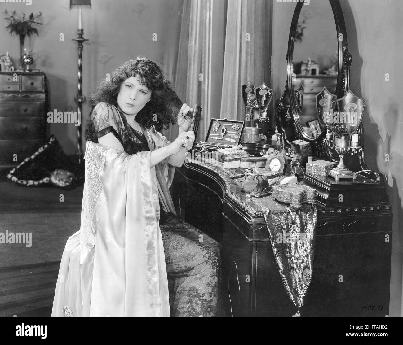 BEDROOM SCENE, 1920s. /nA silent movie still, 1920s. Stock Photo