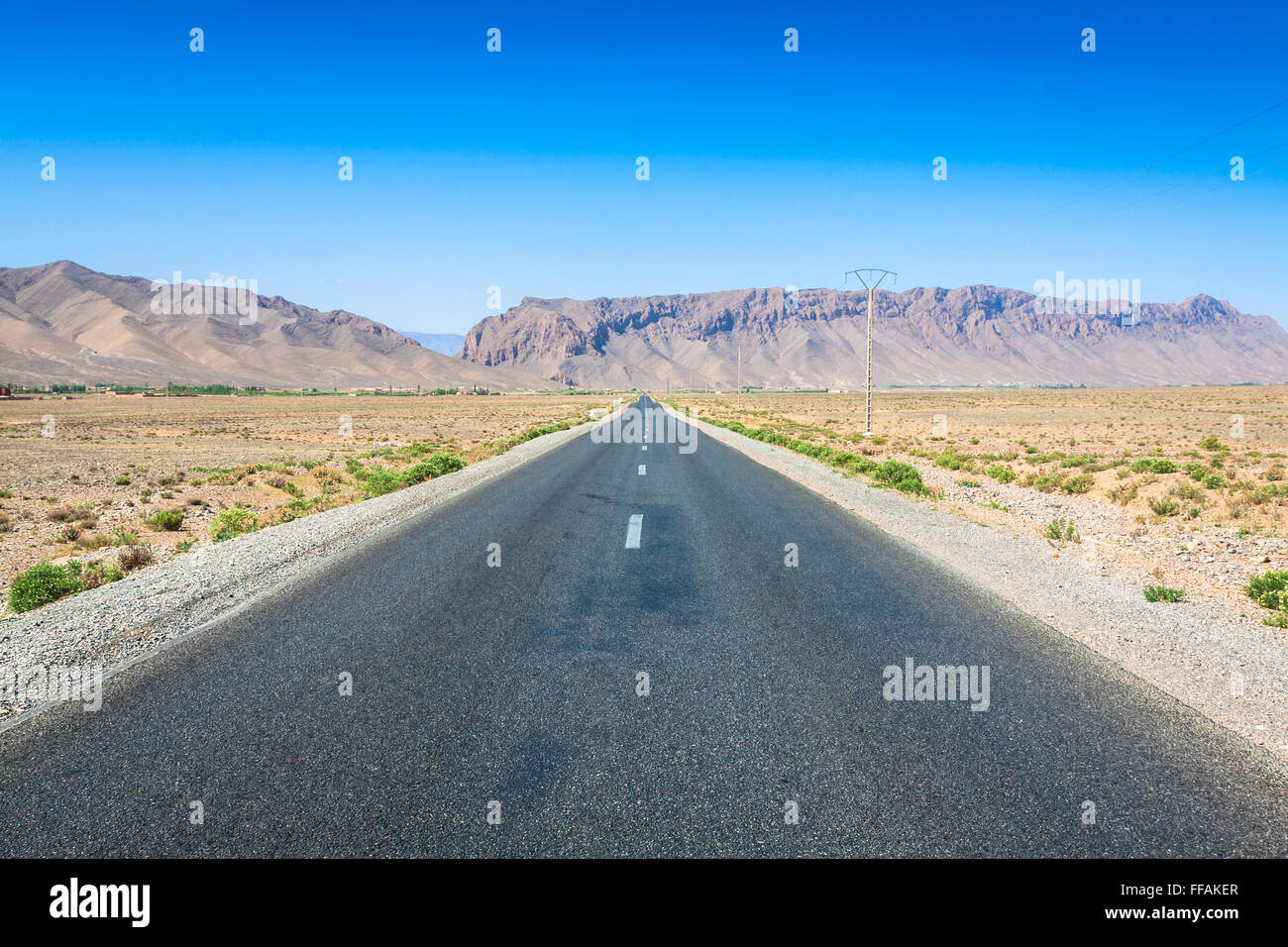 Desert road in Morocco Stock Photo - Alamy