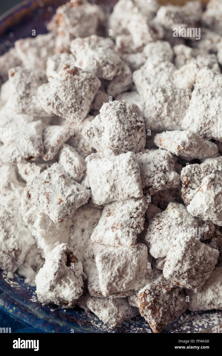 Homemade Powdered Sugar Puppy Chow Muddy Buddies to Eat Stock Photo