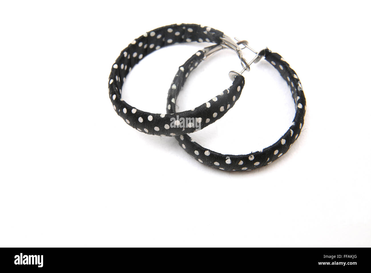 Dress Jewellery - Black And White Polka Dot Hoop Earrings Stock Photo