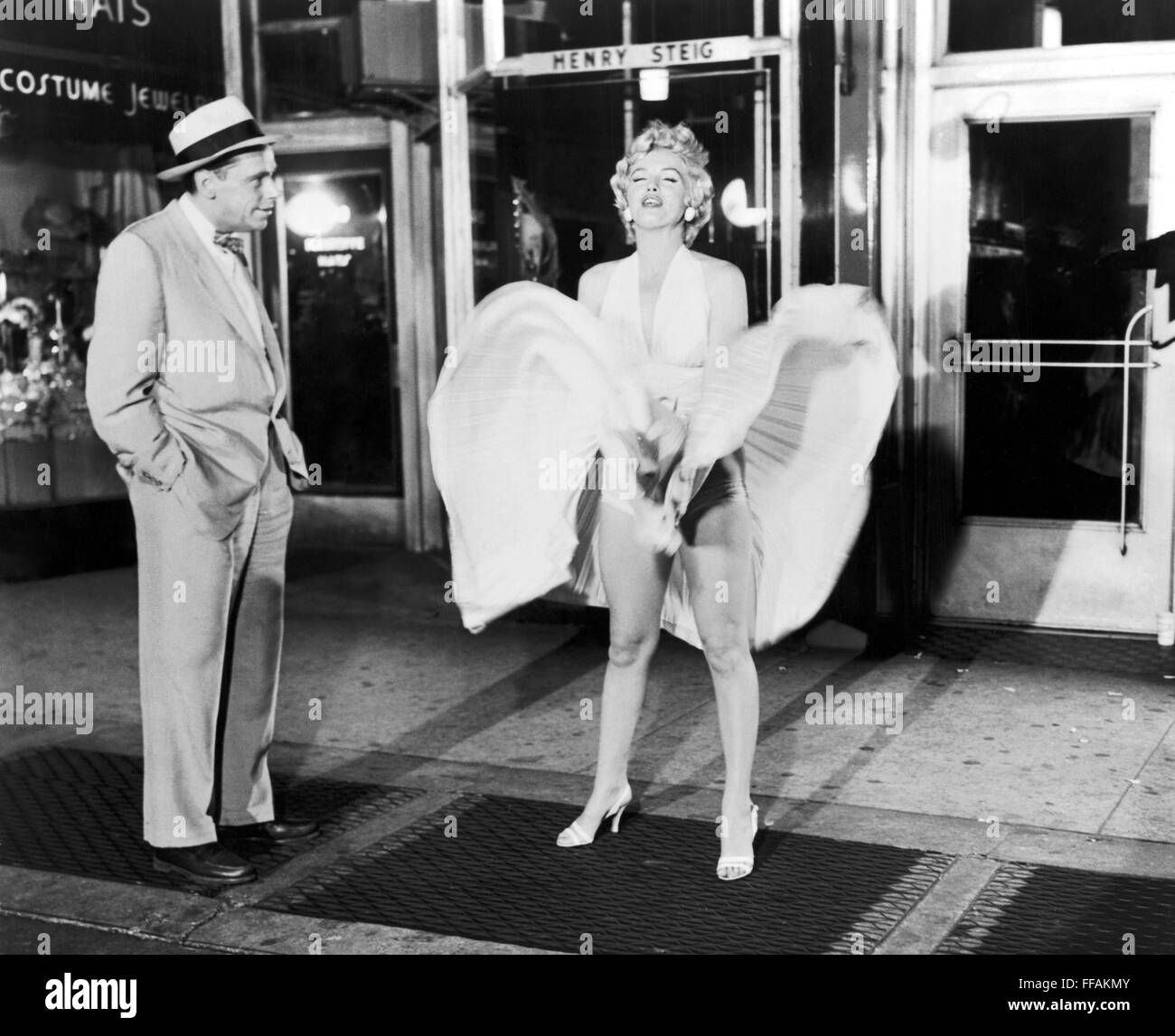 MARILYN MONROE (1926-1962). /nAmerican cinema actress. With Tom Ewell in a scene from The Seven Year Itch, 1955. Stock Photo