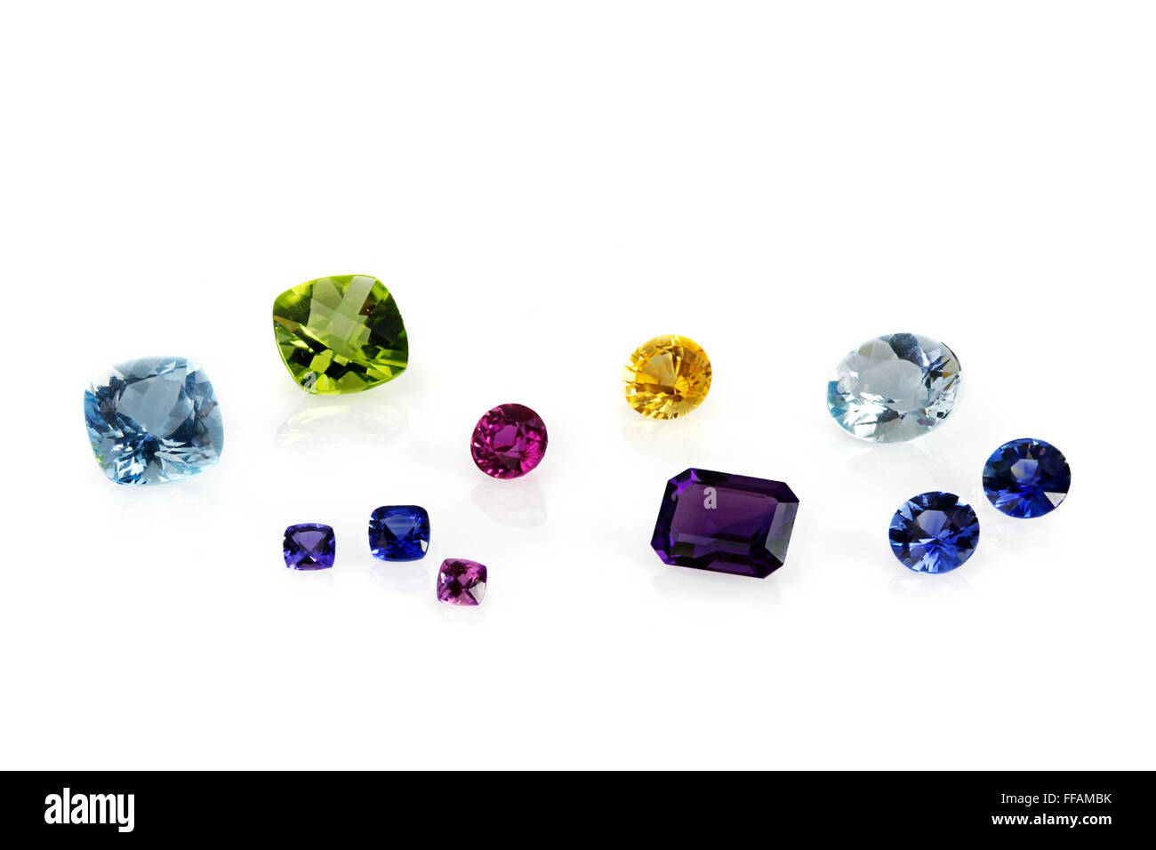 Assorted Gemstones, aquamarine, peridot, yellow sapphire, amethyst, sapphire, tourmaline Stock Photo