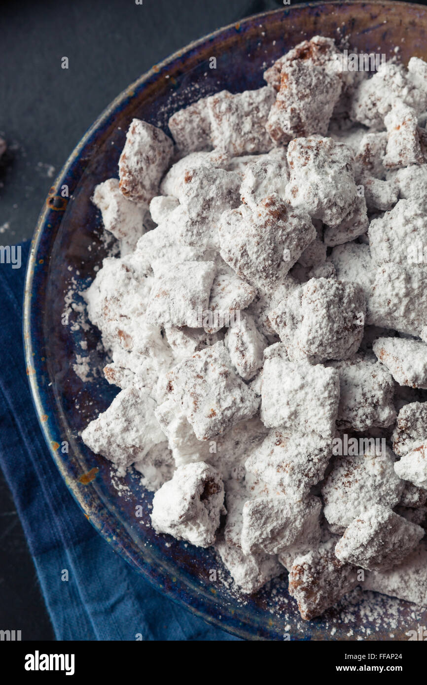 Homemade Powdered Sugar Puppy Chow Muddy Buddies to Eat Stock Photo
